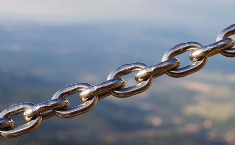 A chain with view of a valley