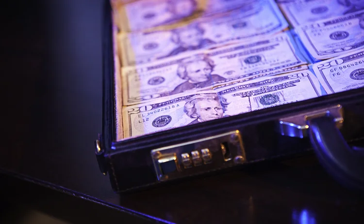 money in briefcase